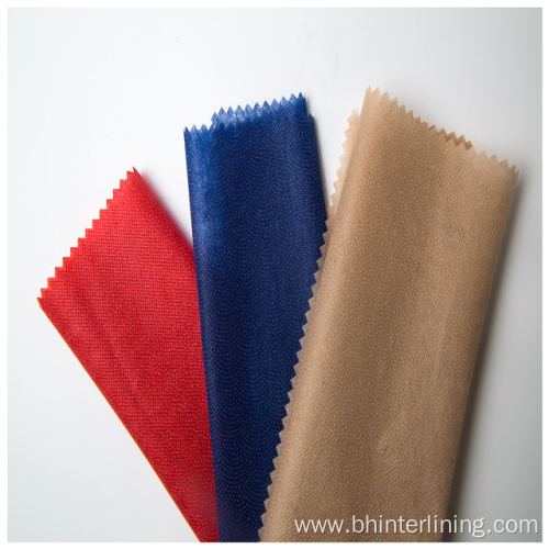 Colorful dyed nonwoven fusible lining and interlining fabric